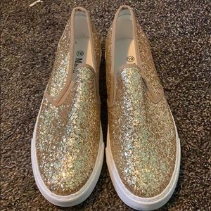 Size 10 gold glitter slip ons. Never worn